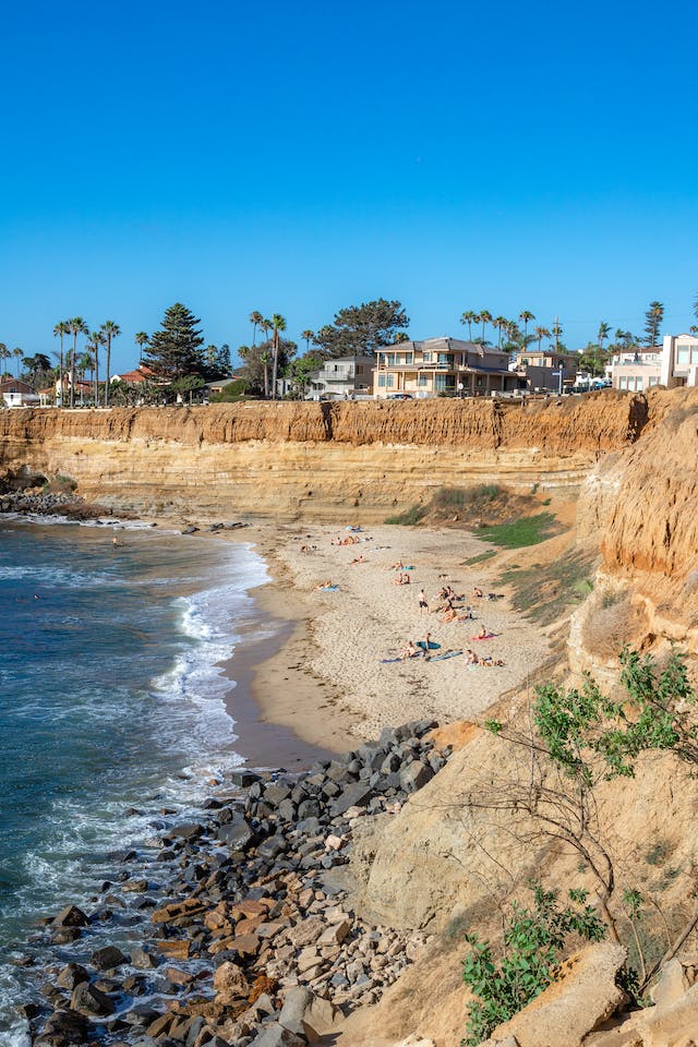 Encinitas, a coastal town in the San Diego area, featuring its popular beach, the Self-Realization Fellowship Temple, and the vibrant downtown area.